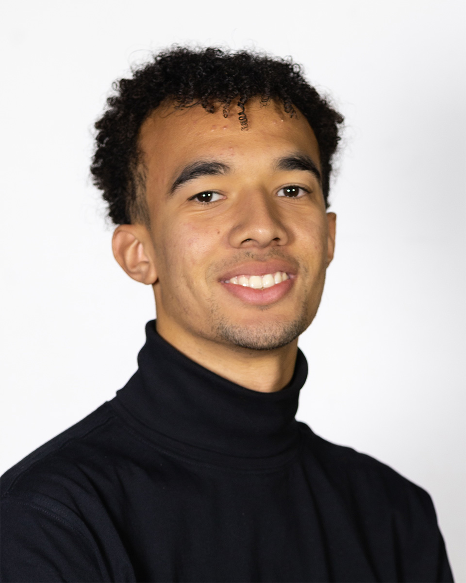 A portrait of TJ Hampton